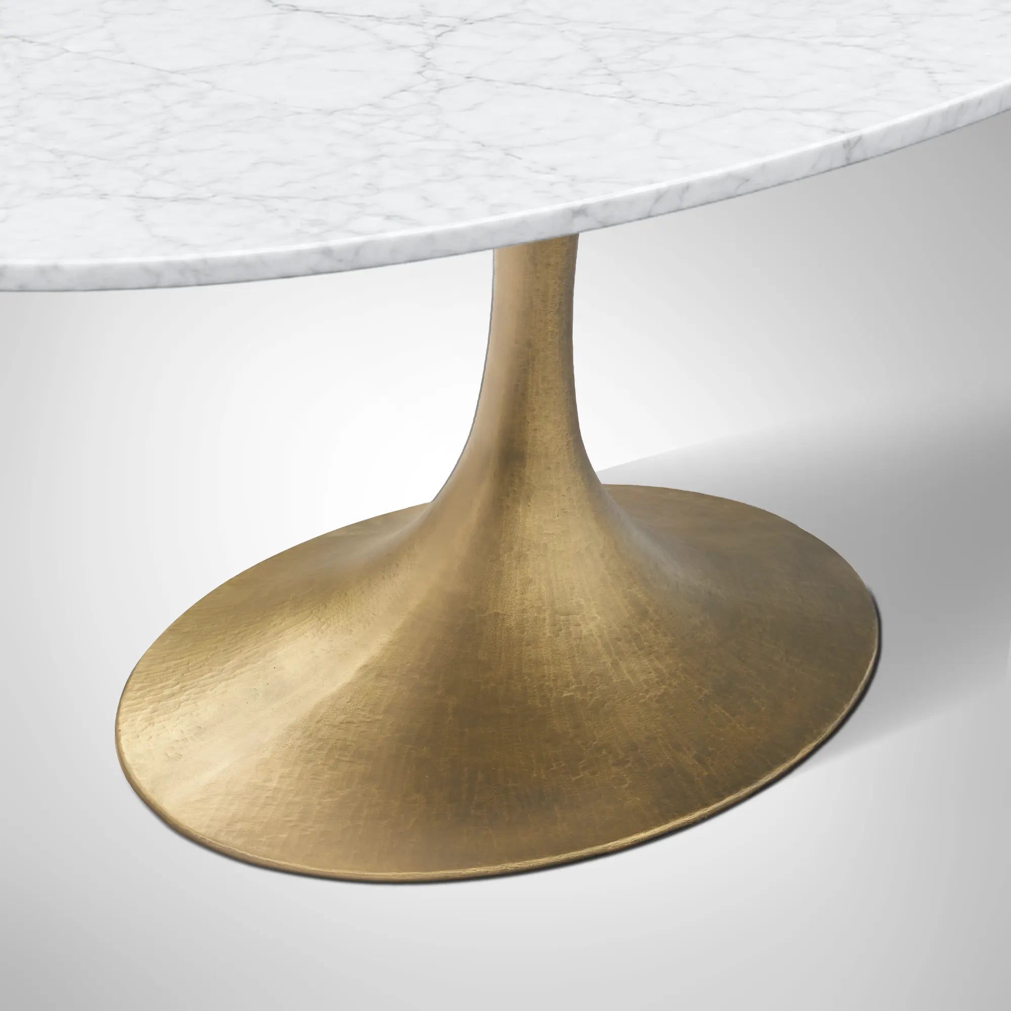 Aero Oval Stone Dining Table with Marble Top and Cast Steel Pedestal Base