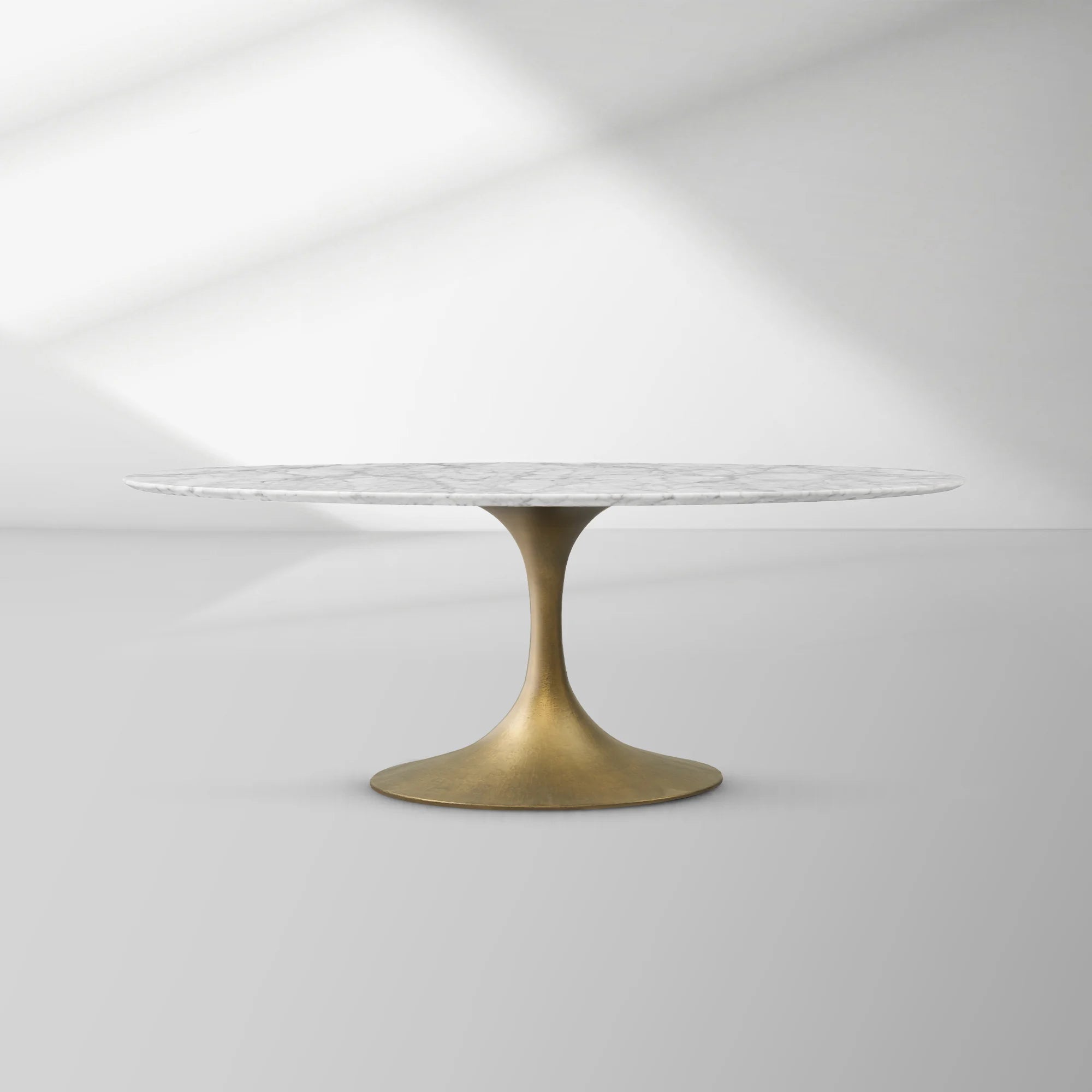 Aero Oval Stone Dining Table with Marble Top and Cast Steel Pedestal Base
