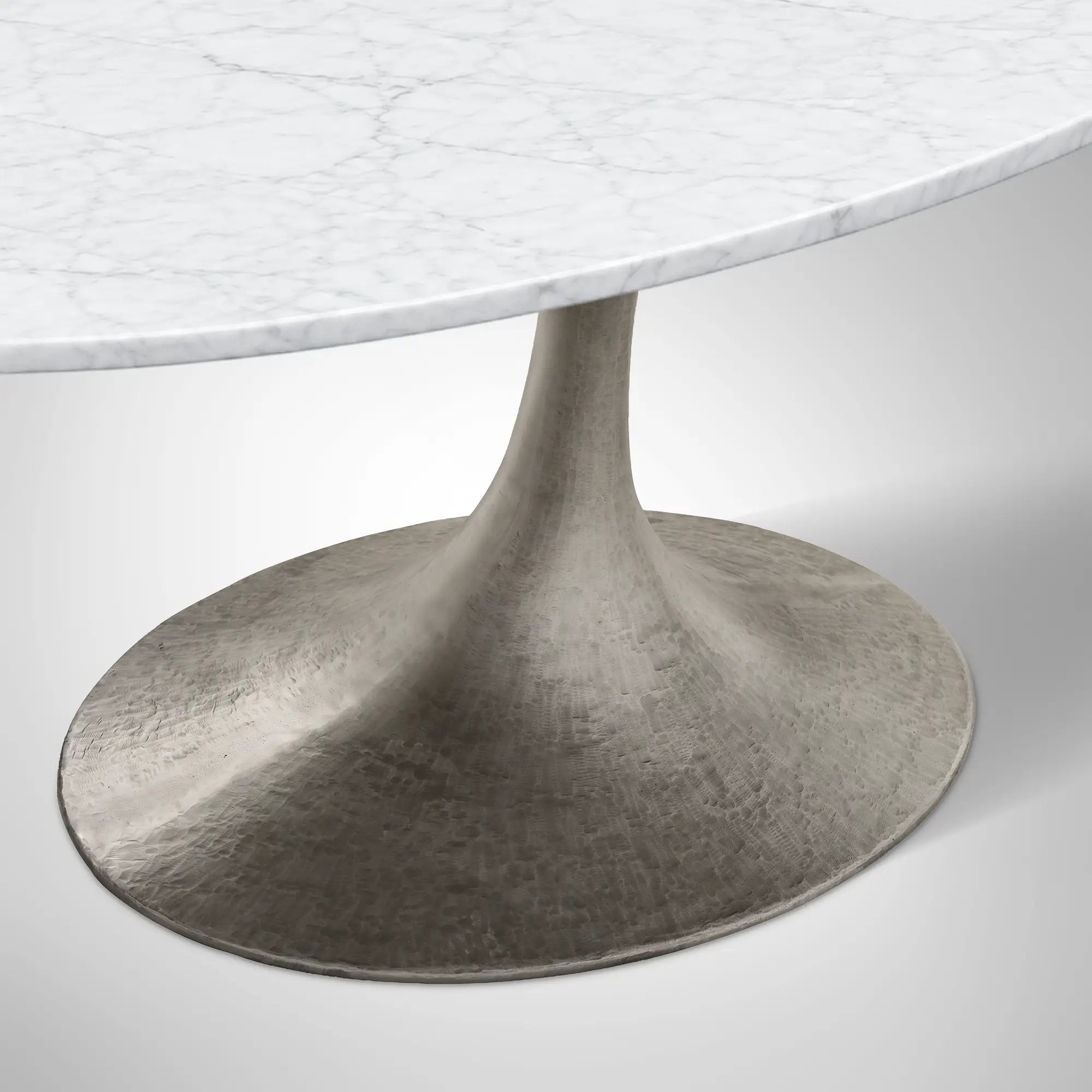 Aero Oval Stone Dining Table with Marble Top and Cast Steel Pedestal Base