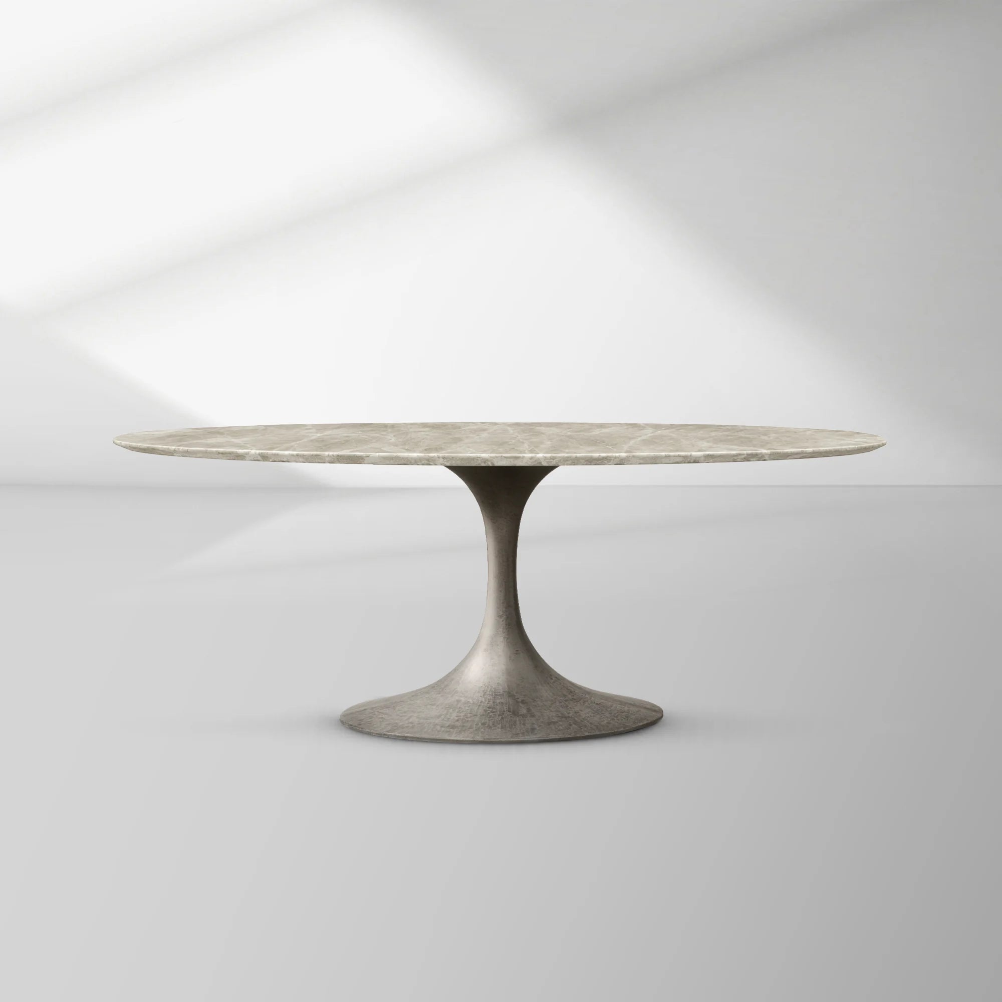 Aero Oval Stone Dining Table with Marble Top and Cast Steel Pedestal Base