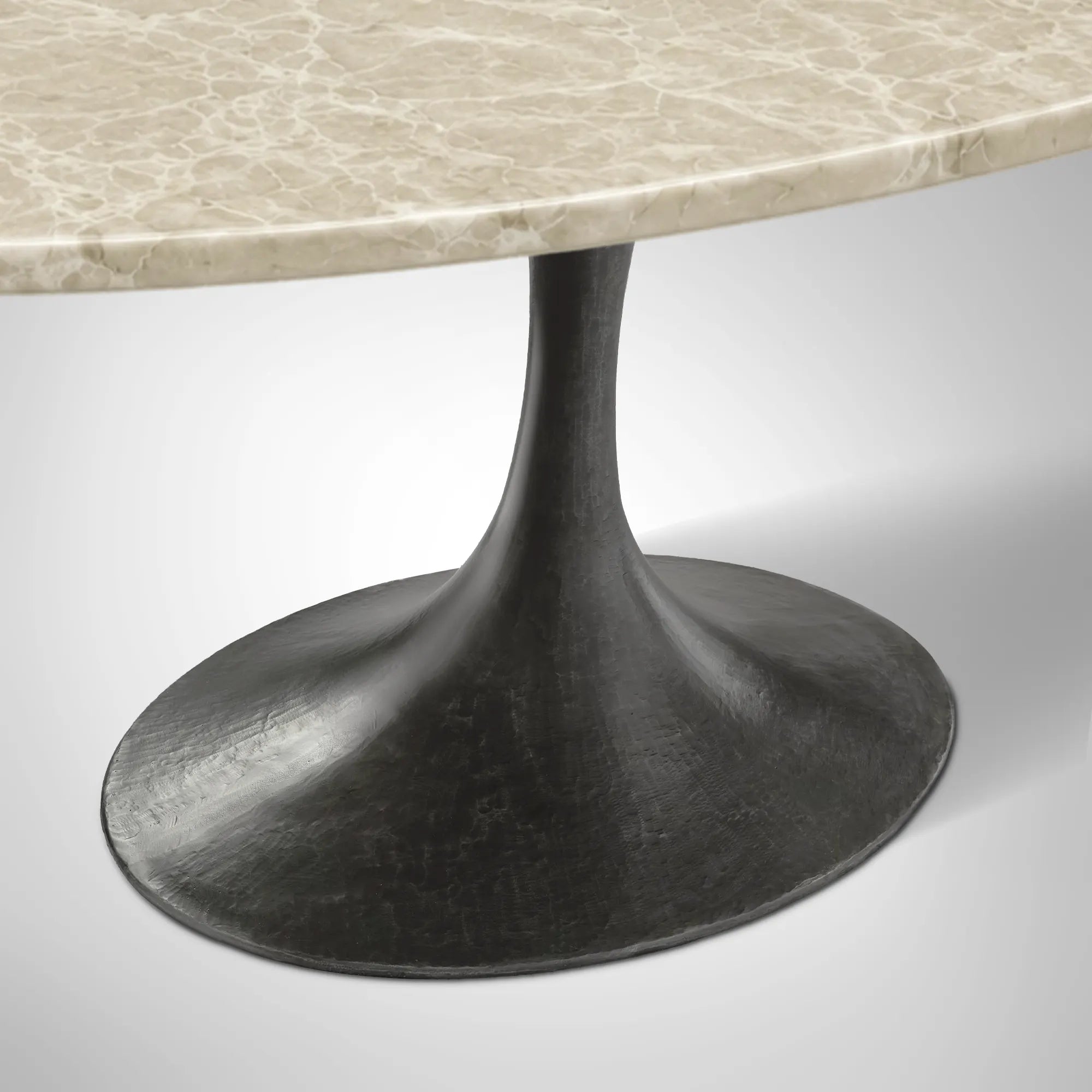 Aero Oval Stone Dining Table with Marble Top and Cast Steel Pedestal Base