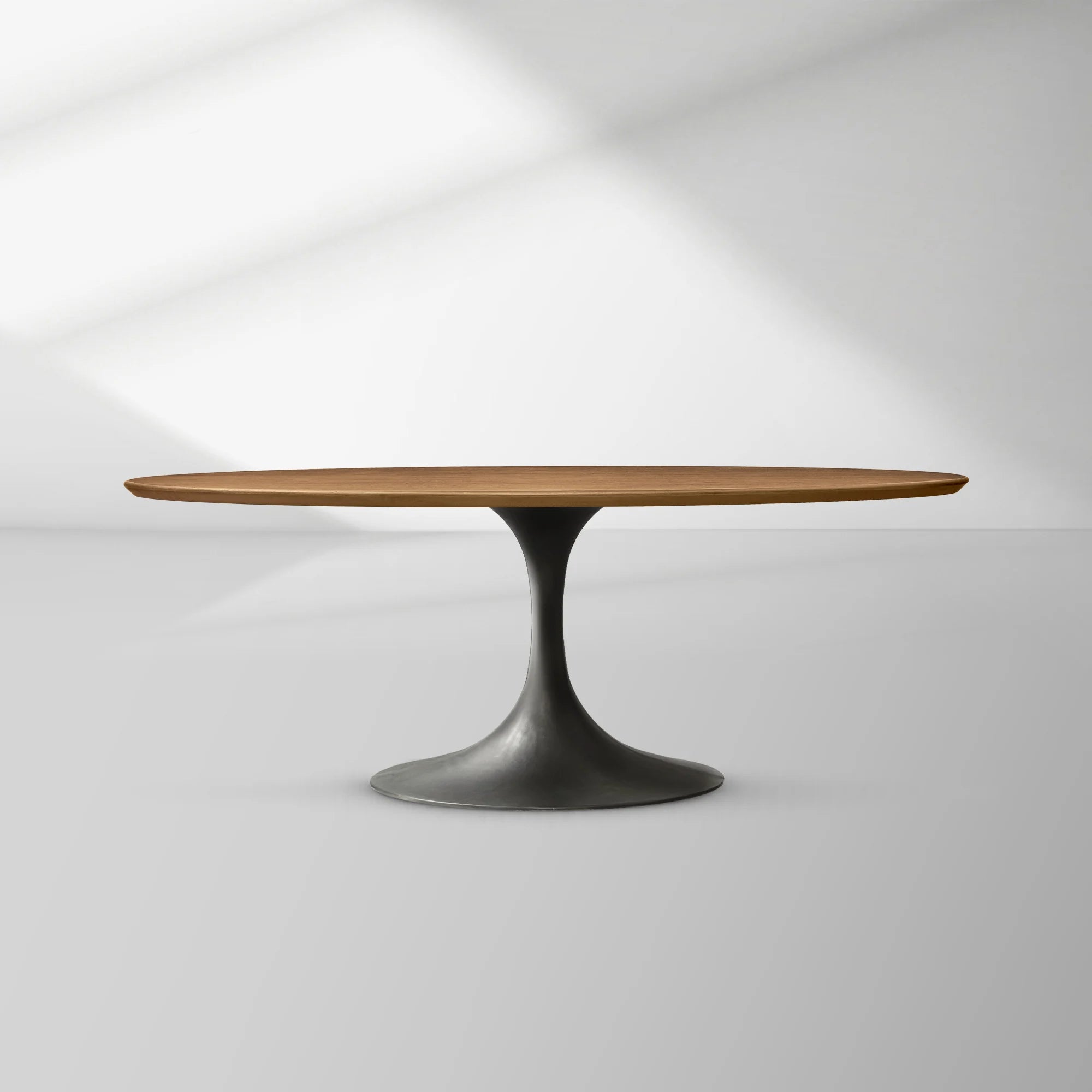 Aero Oval Oak Dining Table with Cast Steel Pedestal Base
