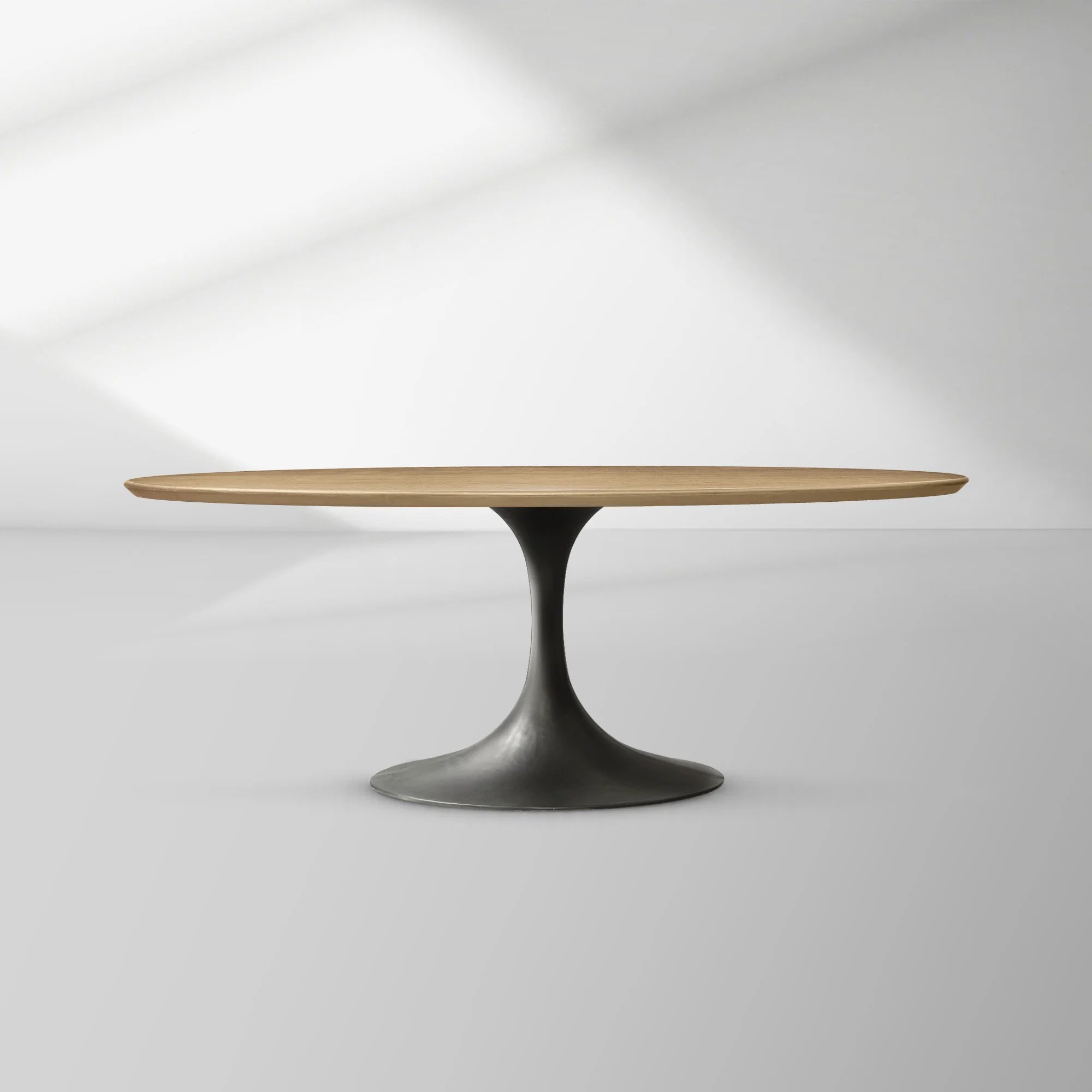 Aero Oval Oak Dining Table with Cast Steel Pedestal Base