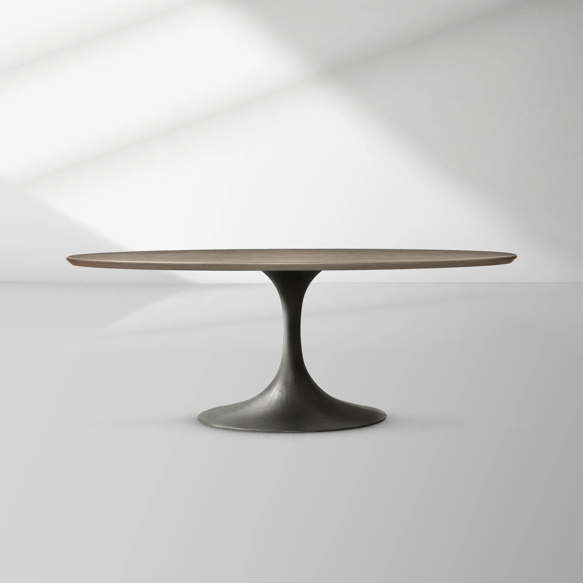 Aero Oval Oak Dining Table with Cast Steel Pedestal Base