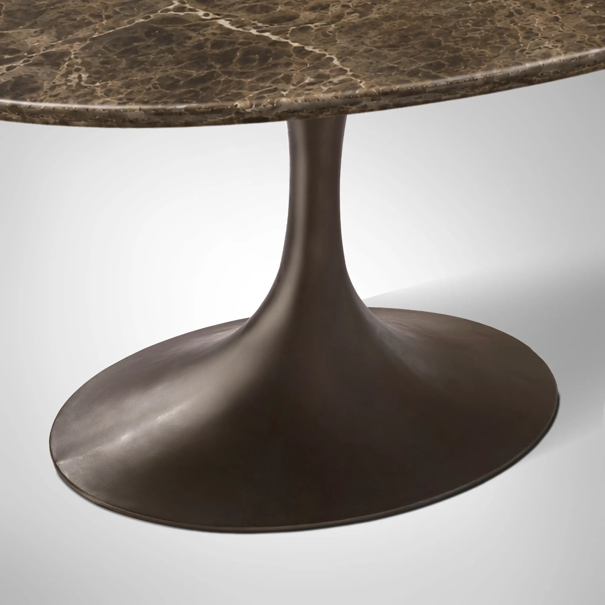 Aero Oval Stone Dining Table with Marble Top and Cast Steel Pedestal Base