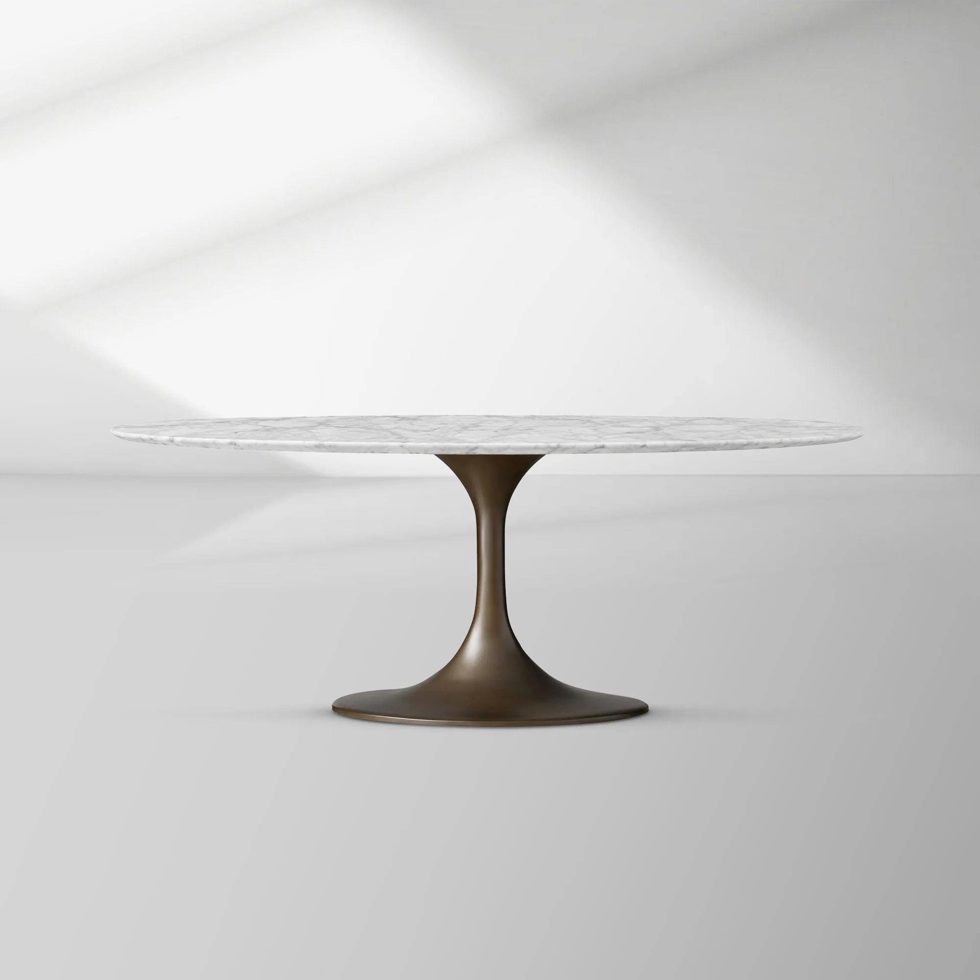 Aero Oval Stone Dining Table with Marble Top and Cast Steel Pedestal Base
