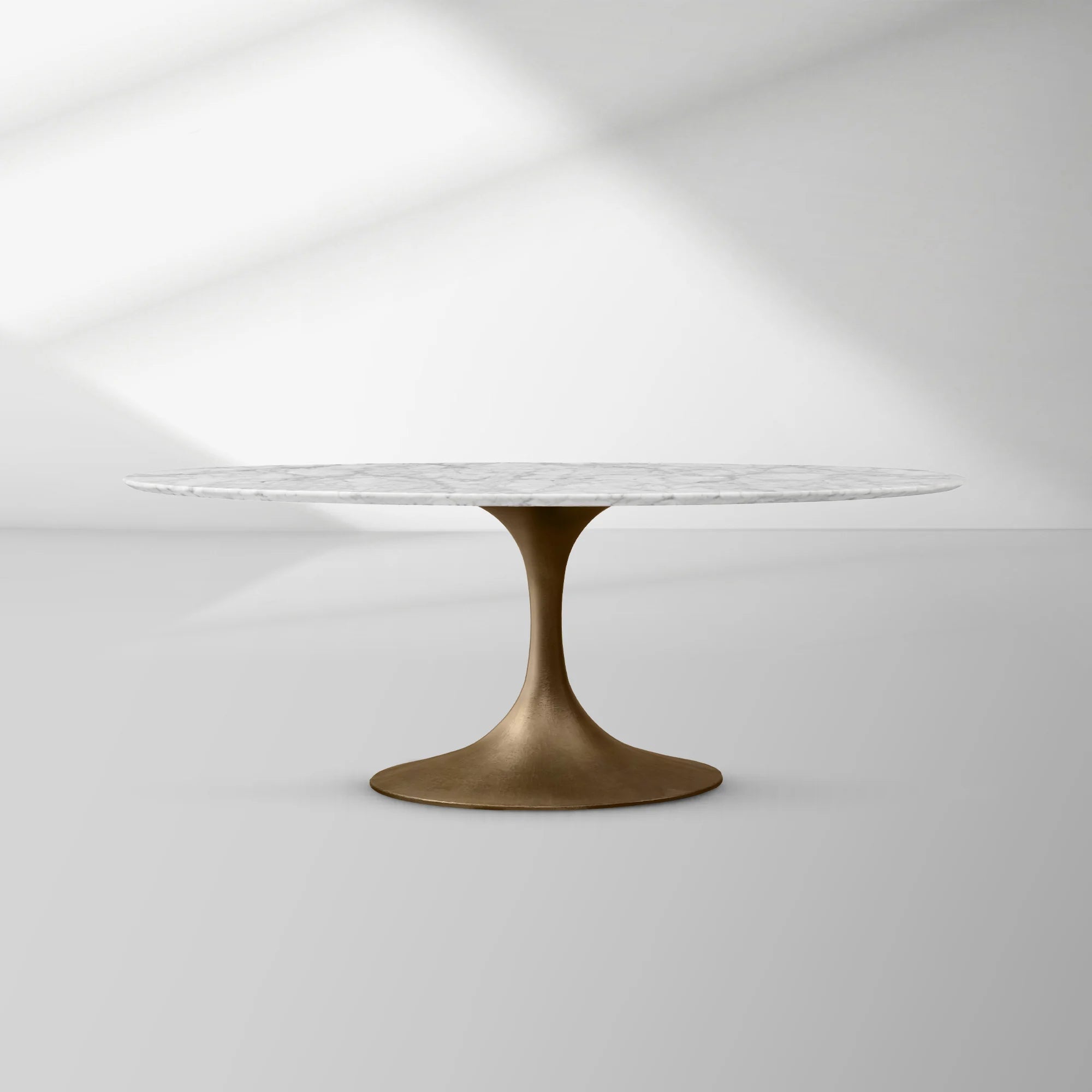 Aero Oval Stone Dining Table with Marble Top and Cast Steel Pedestal Base